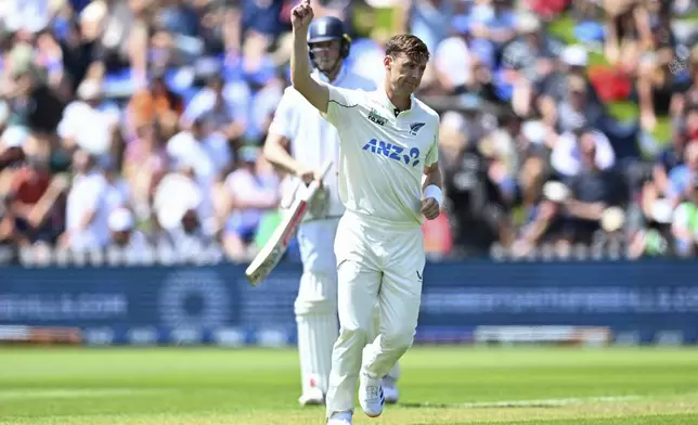 New Zealand's Matt Henry celebrates after taking the wicket of England's Ben Duckett during play on day one of the second cricket test between New Zealand and England at the Basin Reserve in Wellington, New Zealand, Friday, Dec.6, 2024. (Kerry Marshall/Photosport via AP)