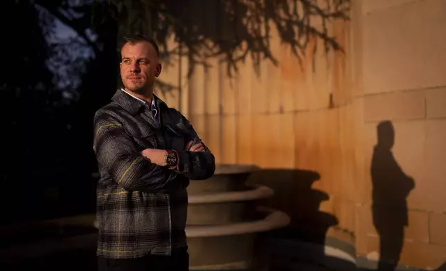 Recreational rugby player Sean McDowell, whose SafeSport case investigator Jason Krasley was fired after being arrested for stealing drug money in his previous job as a police officer, poses for a portrait Wednesday, Dec. 18, 2024, in Seattle. (AP Photo/Lindsey Wasson)