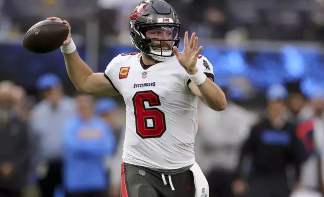 Tampa Bay Buccaneers quarterback Baker Mayfield (6) throws a pass during the first half of an NFL football game against the Tampa Bay Buccaneers, Sunday, Dec. 15, 2024, in Inglewood, Calif. (AP Photo/Ryan Sun)