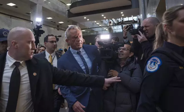 Robert F. Kennedy Jr., President-elect Donald Trump's nominee to be Secretary of Health and Human Services, arrives at the Hart Building to meet with senators at the Capitol in Washington, Monday, Dec. 16, 2024. (AP Photo/J. Scott Applewhite)