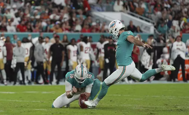 Miami Dolphins place kicker Jason Sanders (7) kicks a field goal during the second half of an NFL football game, Sunday, Dec. 22, 2024, in Miami Gardens, Fla. (AP Photo/Rebecca Blackwell)