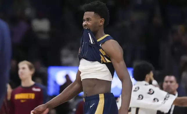 New Orleans Pelicans center Yves Missi reacts after missing his free throws at the end of overtime during an NBA basketball game against the Denver Nuggets in New Orleans, Sunday, Dec. 22, 2024. The Nuggets won in overtime 132-129. (AP Photo/Gerald Herbert)