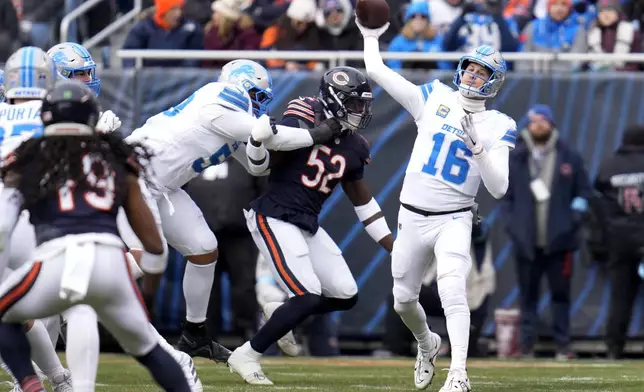 Detroit Lions quarterback Jared Goff throws an 82-yard touchdown pass to wide receiver Jameson Williams during the first half of an NFL football game against the Chicago Bears on Sunday, Dec. 22, 2024, in Chicago. (AP Photo/Erin Hooley)