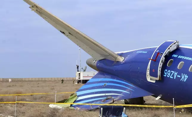 This image from video released by the administration of the Mangystau region of Kazakhstan, shows the wreckage of Azerbaijan Airlines Embraer 190 on the ground near the airport of Aktau, Kazakhstan, Wednesday, Dec. 25, 2024. (Administration of the Mangystau Region via AP)