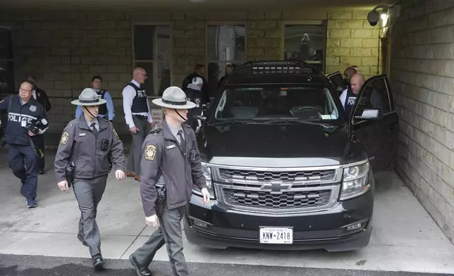 Luigi Nicholas Mangione leaves the Blair County Courthouse in Hollidaysburg, Pa., Thursday, Dec. 19, 2024. (AP Photo/Gene J. Puskar, Pool)