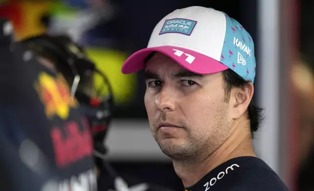 FILE - Red Bull driver Sergio Perez (11) waits for the Formula One Miami Grand Prix auto race to begin at the Miami International Autodrome, Sunday, May 7, 2023, in Miami Gardens, Fla. (AP Photo/Rebecca Blackwell, File)