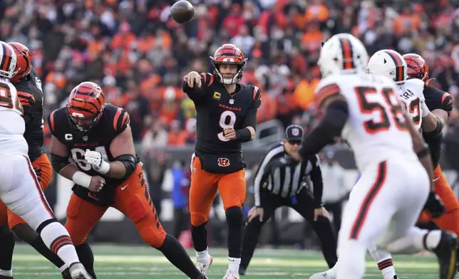 Cincinnati Bengals quarterback Joe Burrow (9) throws the ball during the first half of an NFL football game against the Cleveland Browns, Sunday, Dec. 22, 2024, in Cincinnati. (AP Photo/Jeff Dean)