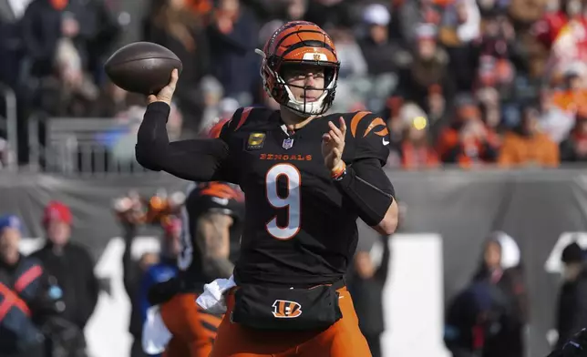 Cincinnati Bengals quarterback Joe Burrow (9) throws during the first half of an NFL football game against the Cleveland Browns, Sunday, Dec. 22, 2024, in Cincinnati. (AP Photo/Joshua A. Bickel)