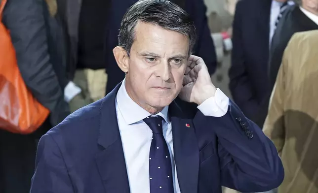 FILE - Former Prime Minister of France Manuel Valls attends a tribute to the late journalist Jean-Pierre Elkabbach in France Televisions headquarters in Paris, Monday, Oct.9 2023. (Christophe Petit Tesson, Pool via AP, File)