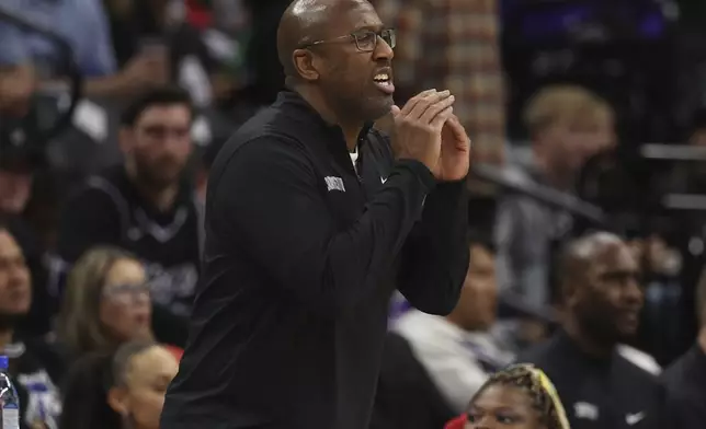 Sacramento Kings head coach Mike Brown yells to his team during the first half of an NBA basketball game against the San Antonio Spurs in Sacramento, Calif., Sunday, Dec. 1, 2024. (AP Photo/Jed Jacobsohn)