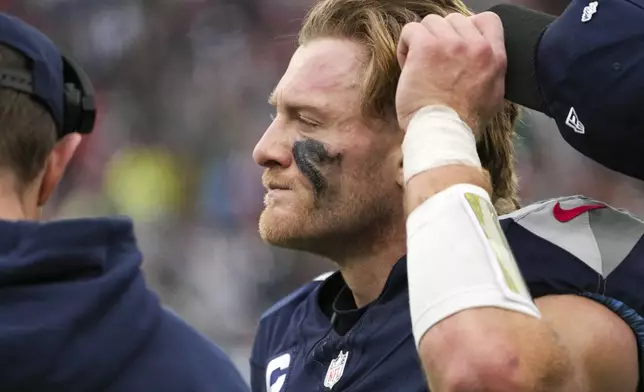 Tennessee Titans quarterback Will Levis (8) looks on from the sideline during the second half of an NFL football game Sunday, Dec. 15, 2024, in Nashville, Tenn. (AP Photo/George Walker IV)