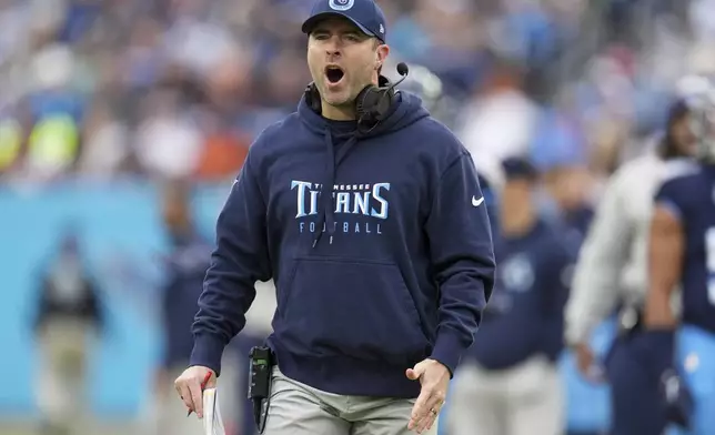 Tennessee Titans head coach Brian Callahan reacts during the first half of an NFL football game against the Cincinnati Bengals, Sunday, Dec. 15, 2024, in Nashville, Tenn. (AP Photo/George Walker IV)