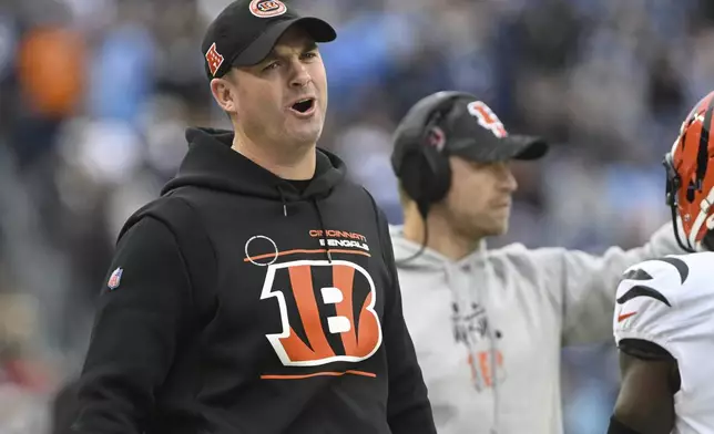 Cincinnati Bengals head coach Zac Taylor reacts during the first half of an NFL football game against the Tennessee Titans, Sunday, Dec. 15, 2024, in Nashville, Tenn. (AP Photo/John Amis)