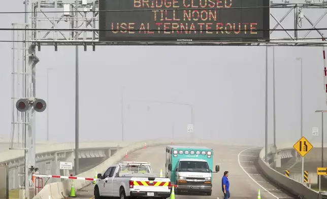 The Lake Pontchartrain Causeway Bridge is closed after dense fog caused multiple car crashes on Tuesday, Dec. 17, 2024. (Brett Duke/The New Orleans Advocate via AP)