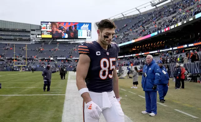 Chicago Bears tight end Cole Kmet walks off the field after his team's 34-17 loss to the Detroit Lions in an NFL football game Sunday, Dec. 22, 2024, in Chicago. (AP Photo/Nam Y. Huh)