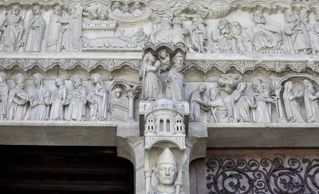 A view of part of a bas-relief outside Notre-Dame de Paris cathedral, Friday, Nov. 29, 2024 in Paris. (Stephane de Sakutin/Pool via AP)