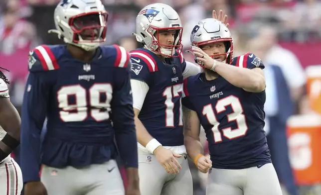 New England Patriots kicker Joey Slye (13) celebrates his field goal against the Arizona Cardinals during the first half of an NFL football game, Sunday, Dec. 15, 2024, in Glendale, Ariz. (AP Photo/Ross D. Franklin)