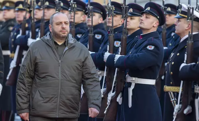 FILE - Ukraine's Defense Minister Rustem Umerov reviews the honor guard on the occasion of a welcome ceremony at the Defense Ministry in Vilnius, Lithuania, Nov. 23, 2024. (AP Photo/Mindaugas Kulbis)