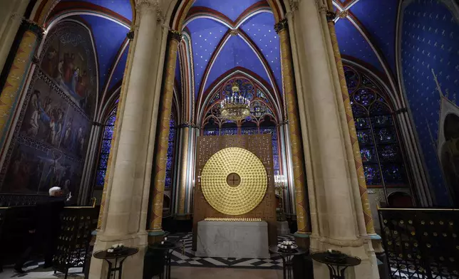 FILE - The reliquary of the Crown of Thorns designed by French artist Sylvain Dubuisson is pictured during the ceremony in Notre Dame Cathedral, Saturday Dec.7, 2024 in Paris. An ancient relic that many Christians revere as Jesus Christ's "Crown of Thorns" is returning to Notre Dame, nearly five years after it was saved from the flames of the cathedral's devastating 2019 fire. ( Ludovic Marin, Pool via AP, File)