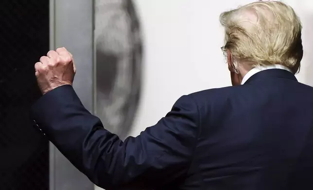 Former President Donald Trump walks to the courtroom at Manhattan criminal court in New York, Wednesday, May 29, 2024. (Charly Triballeau/Pool Photo via AP)