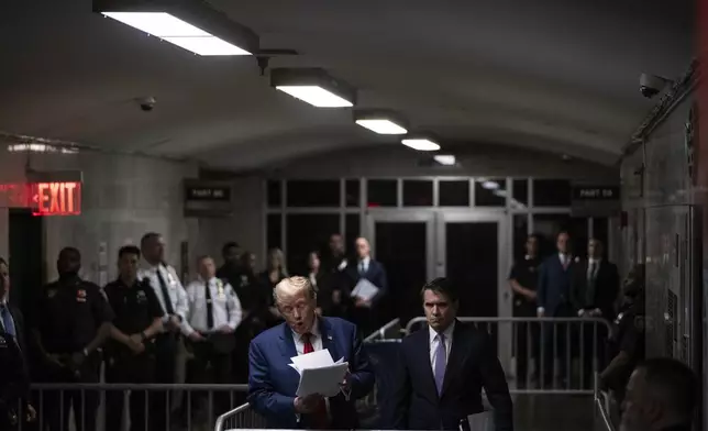 Former President Donald Trump with his attorney Todd Blanche, arrives at Manhattan criminal court in New York, on Friday, May 10, 2024. (Victor J. Blue/The Washington Post via AP, Pool)