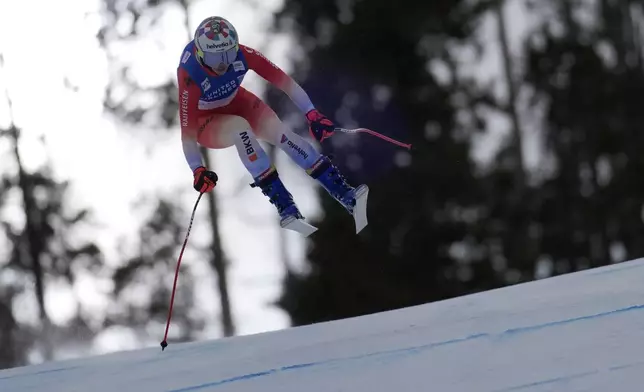 Switzerland's Michelle Gisin skis during a women's World Cup downhill training run, Friday, Dec. 13, 2024, in Beaver Creek, Colo. (AP Photo/John Locher)