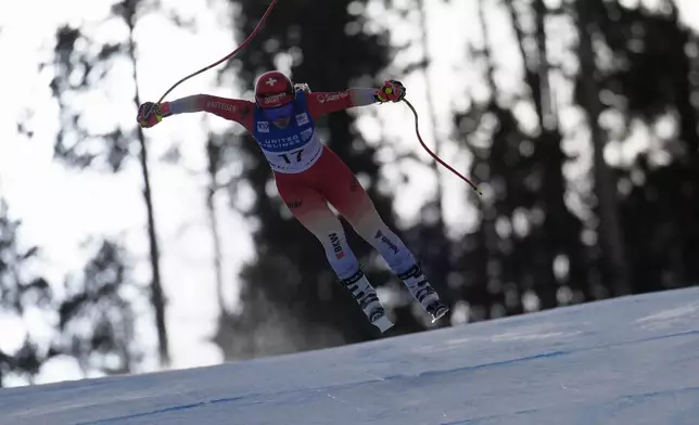 Switzerland's Corinne Suter skis during a women's World Cup downhill training run, Friday, Dec. 13, 2024, in Beaver Creek, Colo. (AP Photo/John Locher)