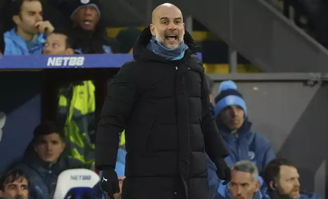 Manchester City's head coach Pep Guardiola reacts during the English Premier League soccer match between Crystal Palace and Manchester City at Selhurst Park in London, Saturday Dec. 7, 2024. (AP Photo/Dave Shopland)