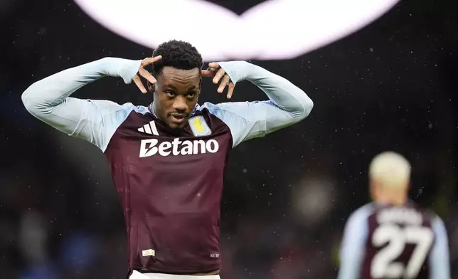 Aston Villa's Jhon Duran celebrates after scoring the opening goal during the English Premier League soccer match between Aston Villa and Southampton at Villa Park, Birmingham, England, Saturday, Dec. 7, 2024. (Nick Potts/PA via AP)