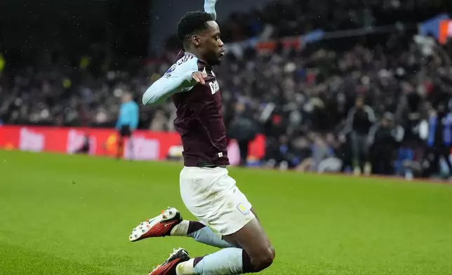 Aston Villa's Jhon Duran celebrates after scoring the opening goal during the English Premier League soccer match between Aston Villa and Southampton at Villa Park, Birmingham, England, Saturday, Dec. 7, 2024. (Nick Potts/PA via AP)