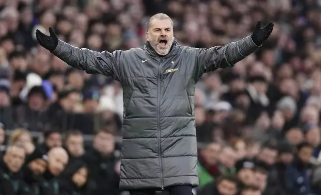 Tottenham Hotspur manager Ange Postecoglou gestures on the touchline during the English Premier League soccer match between Tottenham Hotspur and Wolverhampton Wanderers in London, England, Sunday, Dec. 29, 2024. (John Walton/PA via AP)