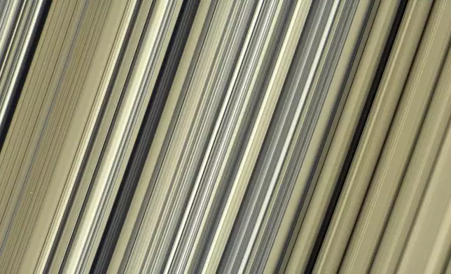 This July 6, 2017 image made available by NASA shows the planet Saturn on the sunlit side of the rings from a distance of about 47,000 miles (76,000 kilometers), as seen from the Cassini spacecraft. (NASA/JPL-Caltech/Space Science Institute via AP)