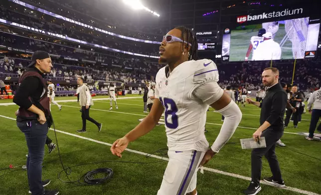 Minnesota Vikings wide receiver Justin Jefferson walks off the field after an NFL football game against the Chicago Bears, Monday, Dec. 16, 2024, in Minneapolis. (AP Photo/Bruce Kluckhohn)