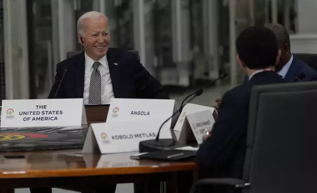 President Joe Biden participates in the Lobito Corridor Trans-Africa Summit at the Carrinho food processing factory near Lobito, Angola, on Wednesday, Dec. 4, 2024. (AP Photo/Ben Curtis)