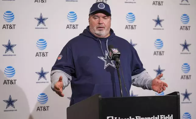 Dallas Cowboys head coach Mike McCarthy talks to reporters following an NFL football game against the Philadelphia Eagles, Sunday, Dec. 29, 2024, in Philadelphia. The Eagles won 41-7. (AP Photo/Chris Szagola)