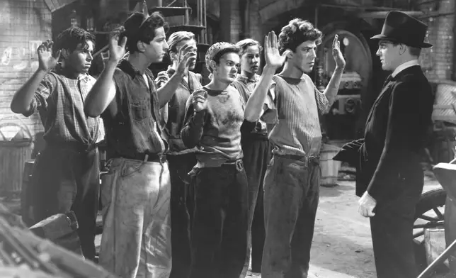 This image released by the Library of Congress shows James Cagney, right, in a scene from the 1938 film "Angels with Dirty Faces." (Warner Bros/Discovery/Library of Congress via AP)