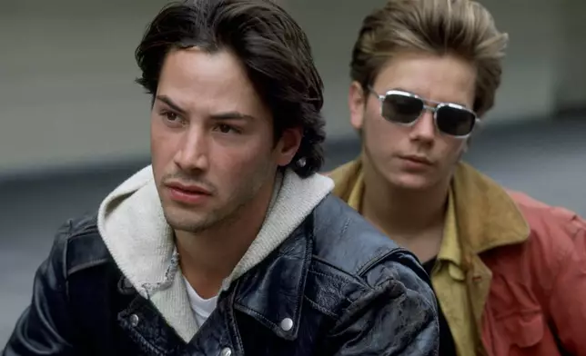 This image released by the Library of Congress shows Keanu Reeves, left, and River Phoenix in a scene from the 1991 film "My Own Private Idaho." (Criterion/Library of Congress via AP)