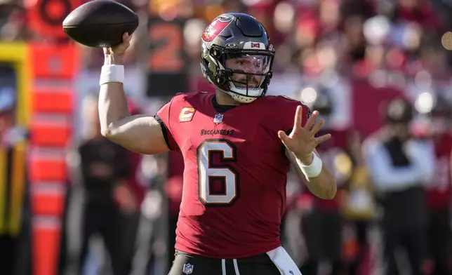 Tampa Bay Buccaneers quarterback Baker Mayfield (6) passes in the pocket against the Las Vegas Raiders during the second half of an NFL football game, Sunday, Dec. 8, 2024, in Tampa, Fla. (AP Photo/Chris O'Meara)