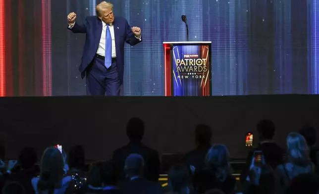 President-elect Donald Trump dances after speaking at the FOX Nation Patriot Awards, Thursday, Dec. 5, 2024, in Greenvale, N.Y. (AP Photo/Heather Khalifa)