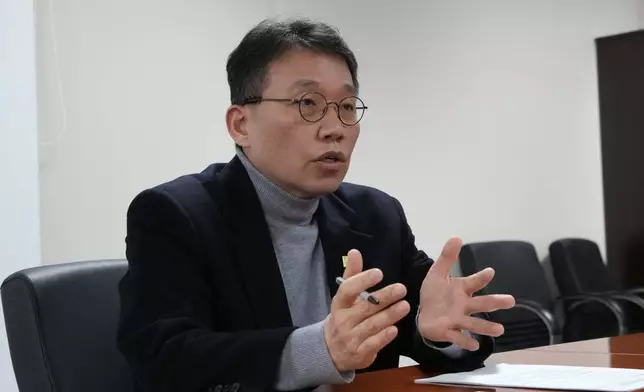 Chung Ick-Joong, the president of the National Center for the Rights of the Child, speaks during an interview with The Associated Press in Seoul, South Korea, Tuesday, Dec. 24 2024. (AP Photo/Ahn Young-joon)