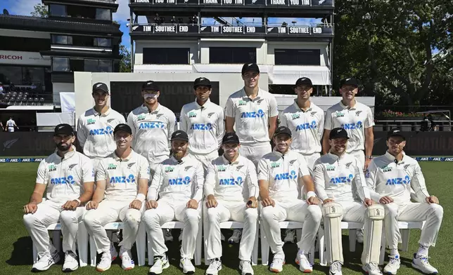 The New Zealand cricket team pose for a group photo ahead of play on day four of the third cricket test between England and New Zealand in Hamilton, New Zealand, Tuesday, Dec. 17, 2024. (Andrew Cornaga/Photosport via AP)