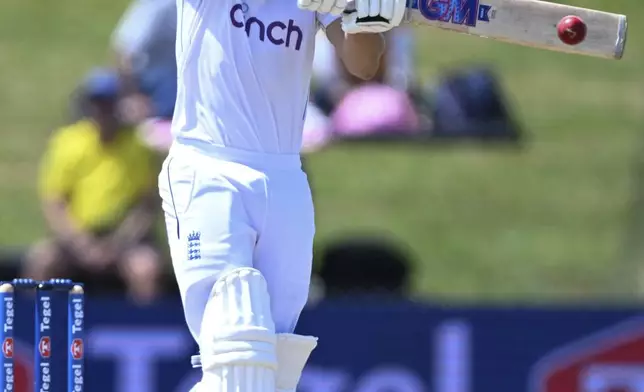 England's Jacob Bethell bats during play on day four of the third cricket test between England and New Zealand in Hamilton, New Zealand, Tuesday, Dec. 17, 2024. (Andrew Cornaga/Photosport via AP)