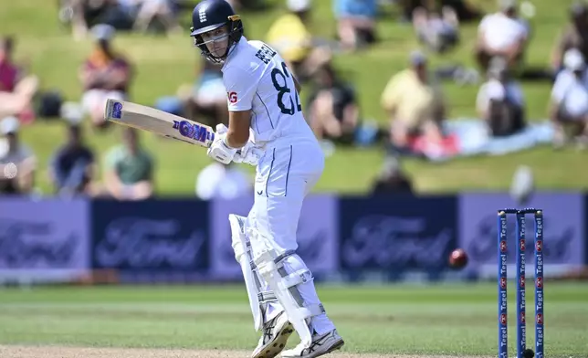 England's Jacob Bethell bats during play on day four of the third cricket test between England and New Zealand in Hamilton, New Zealand, Tuesday, Dec. 17, 2024. (Andrew Cornaga/Photosport via AP)