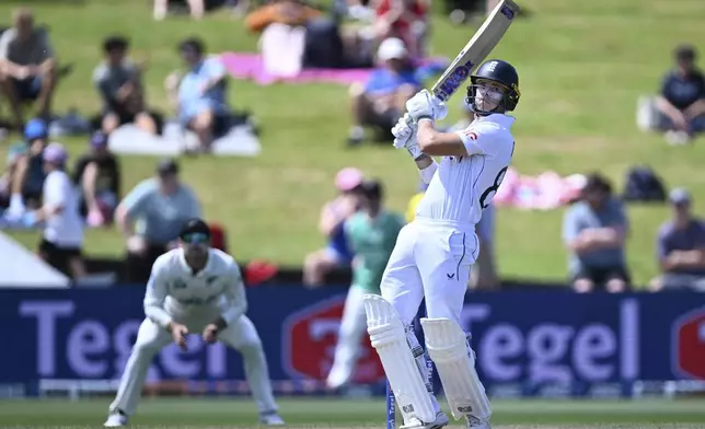 England's Jacob Bethell bats during play on day four of the third cricket test between England and New Zealand in Hamilton, New Zealand, Tuesday, Dec. 17, 2024. (Andrew Cornaga/Photosport via AP)