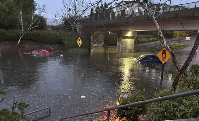 This image, provided by the Livermore Police Dept. shows flooding near the intersection of Murrieta Blvd. and Stanley Blvd. during a storm Saturday, Dec. 14, 2024 in Livermore, Calif. (Livermore Police Dept. via AP)