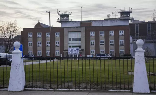 The sun sets behind Indiana State Prison on Tuesday, Dec. 17, 2024, in Michigan City, Ind., where, barring last-minute court action or intervention by Gov. Eric Holcomb, Joseph Corcoran, 49, convicted in the 1997 killings of his brother and three other people, is scheduled to be put to death by lethal injection before sunrise Wednesday, Dec. 18. (AP Photo/Erin Hooley)