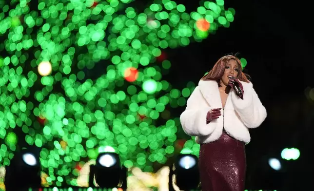 Mickey Guyton performs during the National Christmas Tree lighting ceremony on the Ellipse near the White House in Washington, Thursday, Dec. 5, 2024. (AP Photo/Mark Schiefelbein)