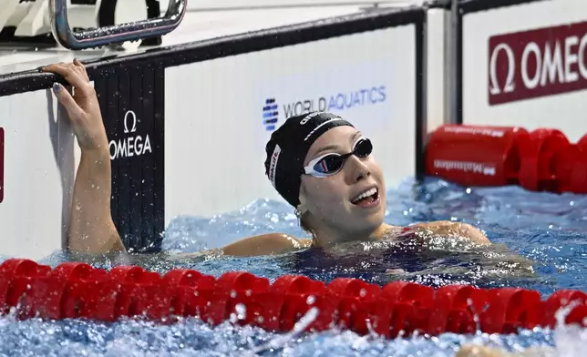 Gretchen Walsh reacts after the team USA won the 4x100 meter final during the World Short Course Swimming Championships in Budapest, Hungary, Tuesday, Dec. 10, 2024. (AP Photo/Denes Erdos)