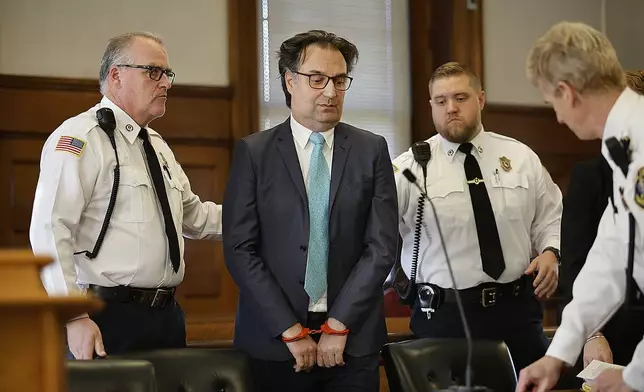 Brian Walshe arrives in court for his trial at the Norfolk Superior Court in Dedham, Mass. Monday, Dec. 2, 2024. (Greg Derr/The Patriot Ledger via AP)