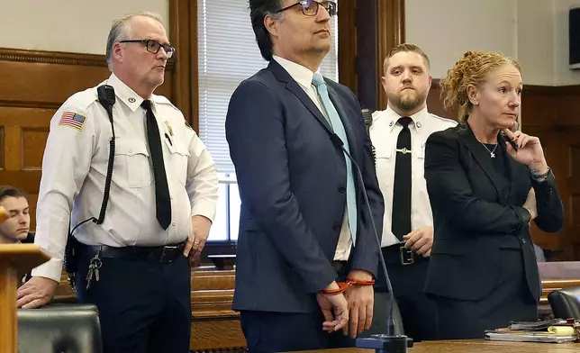 Brian Walshe and one of his lawyers Kelli Porges arrives at the Norfolk Superior Court in Dedham, Mass. Monday, Dec. 2, 2024. (Greg Derr/The Patriot Ledger via AP)